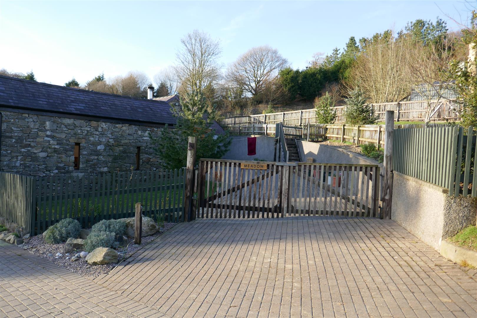SPACIOUS PAVED YARD